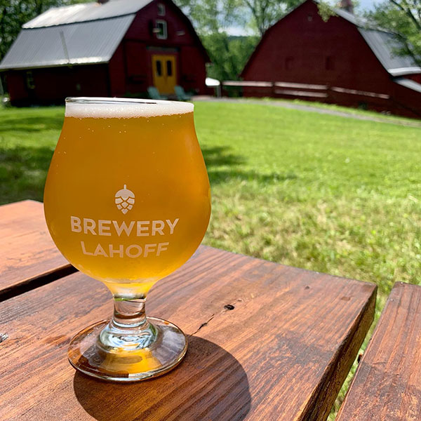 Enjoy a glass at a picnic table